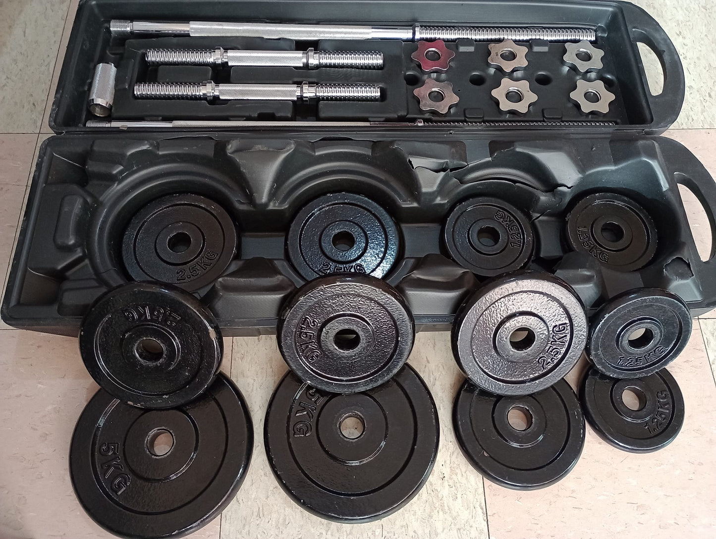 Kit pesas 50 Kilos en hierro con estuche barra larga 1,50